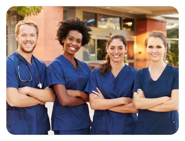 A group of nurses standing next to each other.